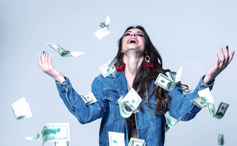 Happy woman enjoy her money