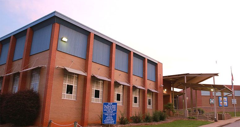 Picture of an high school with reddish brown color