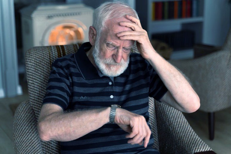 A man looking at his watch