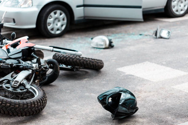 Crashed motocross bike and helmet