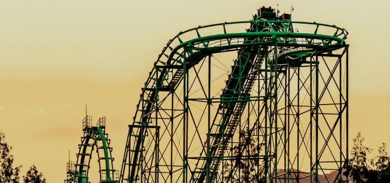 Green roller coaster in the before evening