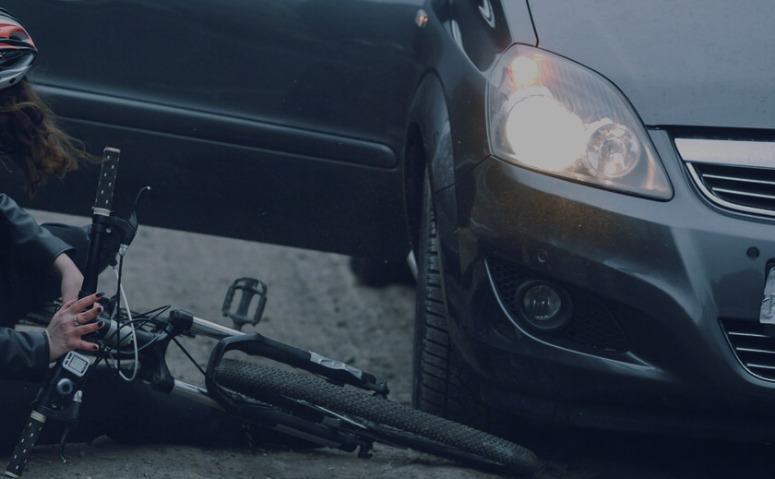 Girl with a bike hit by a car 