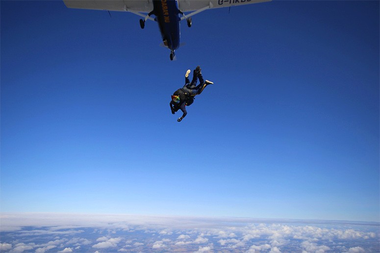 A man jumped out of a plane