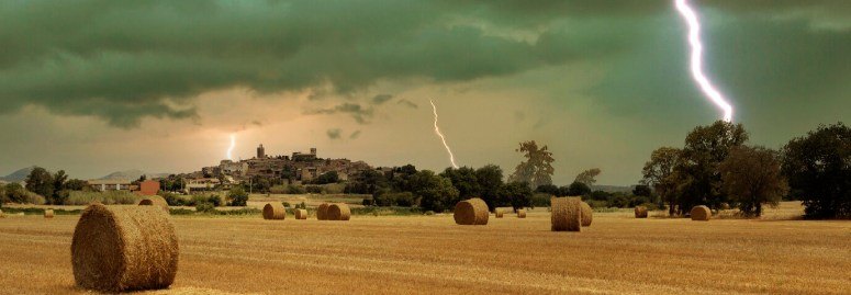 A field of straw bales struck by lightning