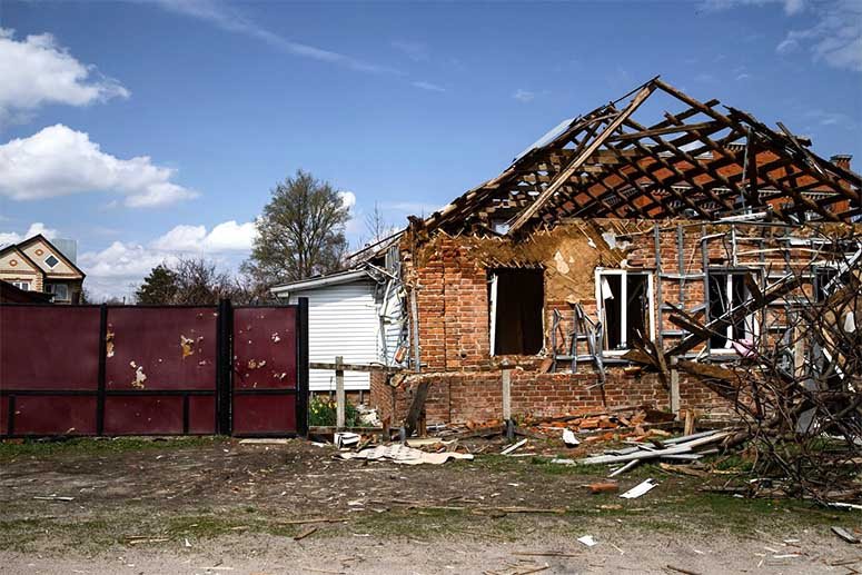 Broken house after burning down twice 