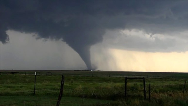 A storm in the field that also has a tornado