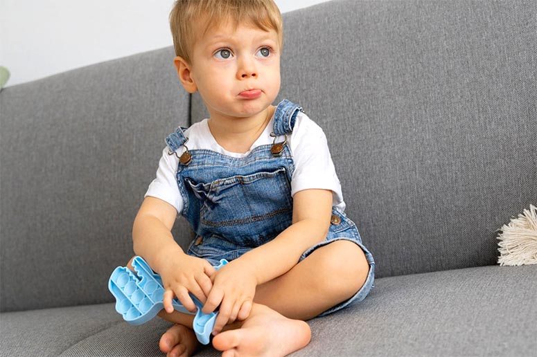 A Boy sitting on the sofa