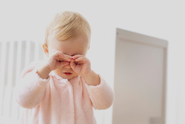 Blond hair crying baby